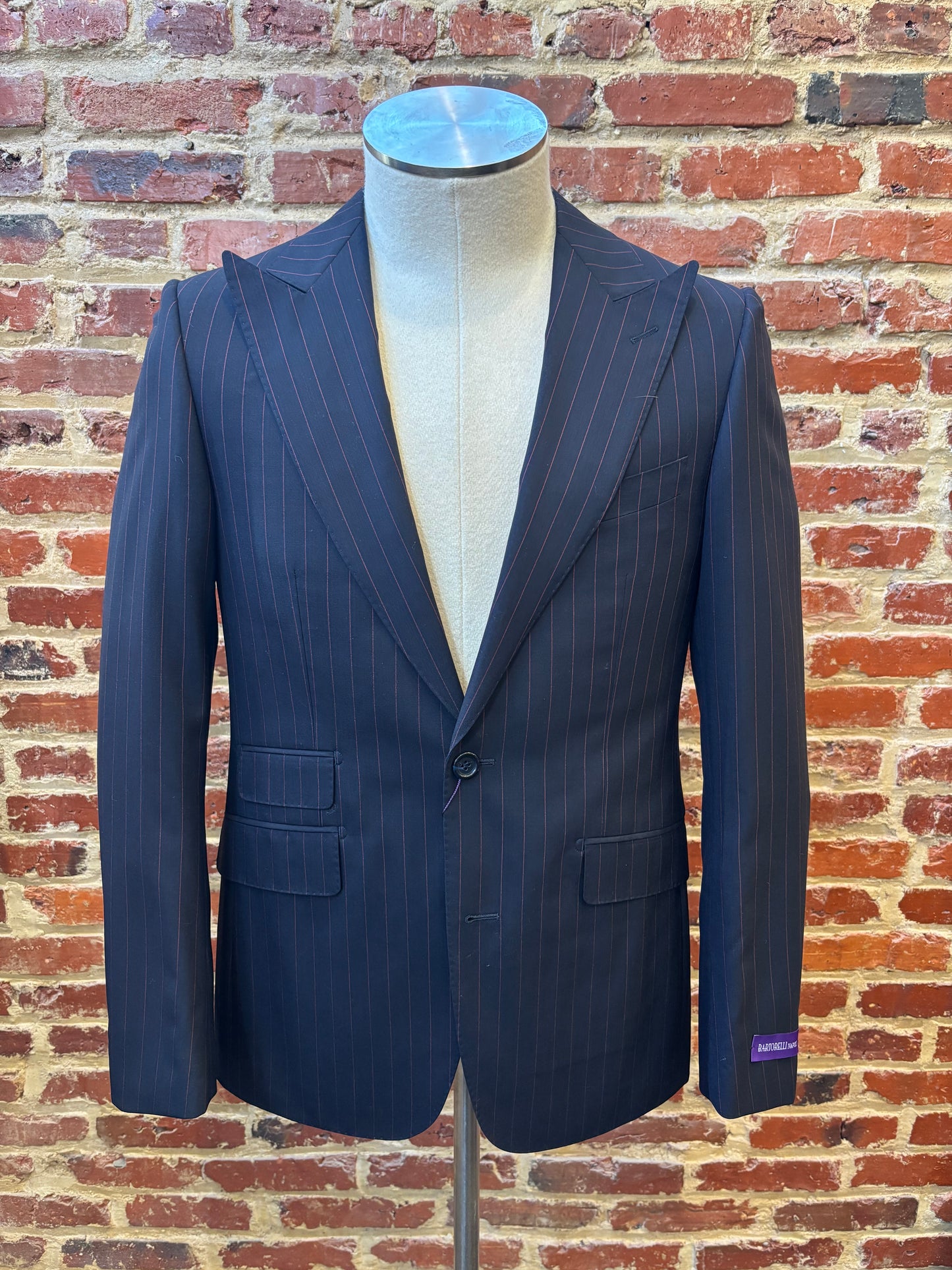 Navy blue suit with red stripes
