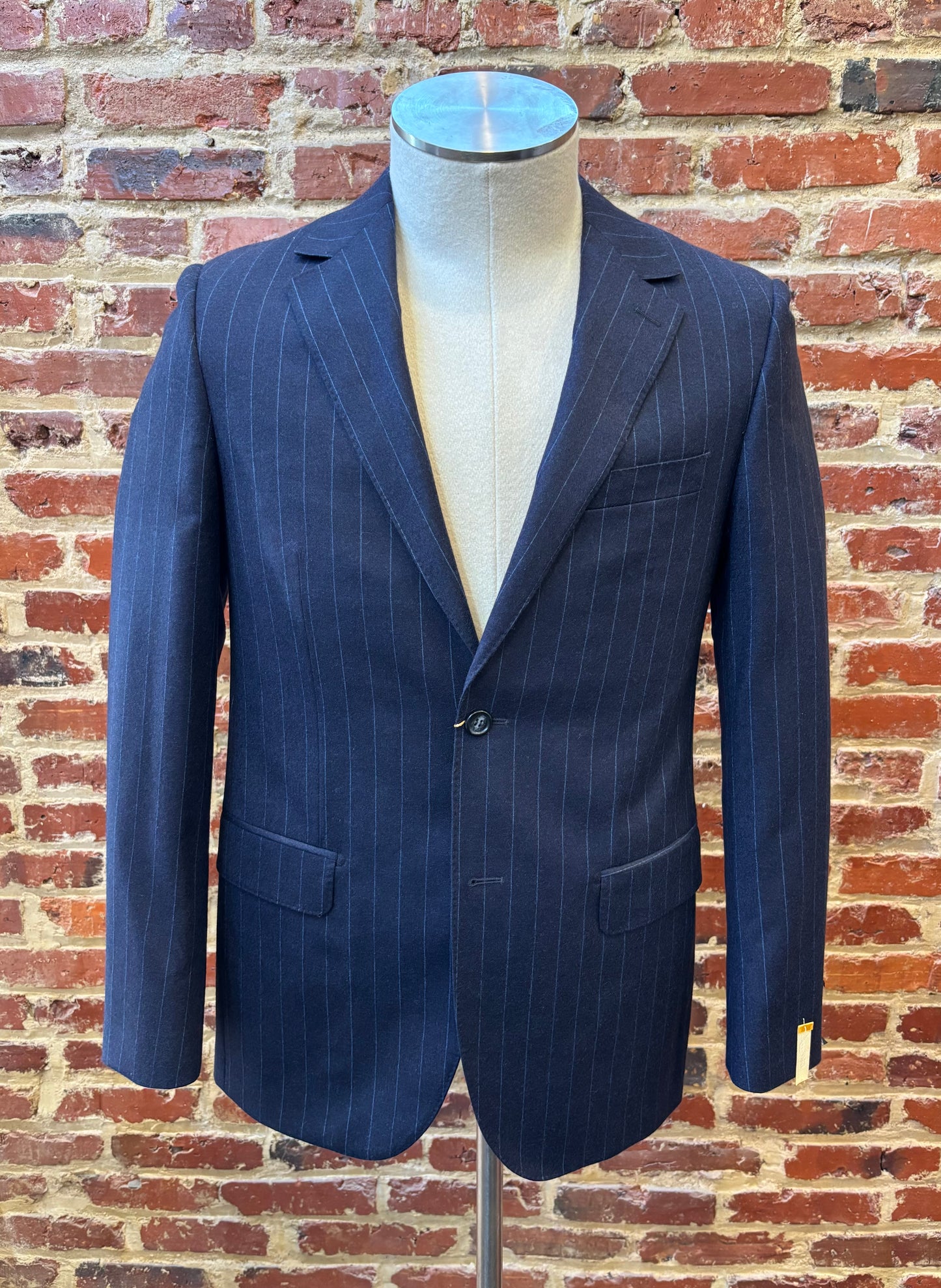 Navy blue suit with light blue stripes