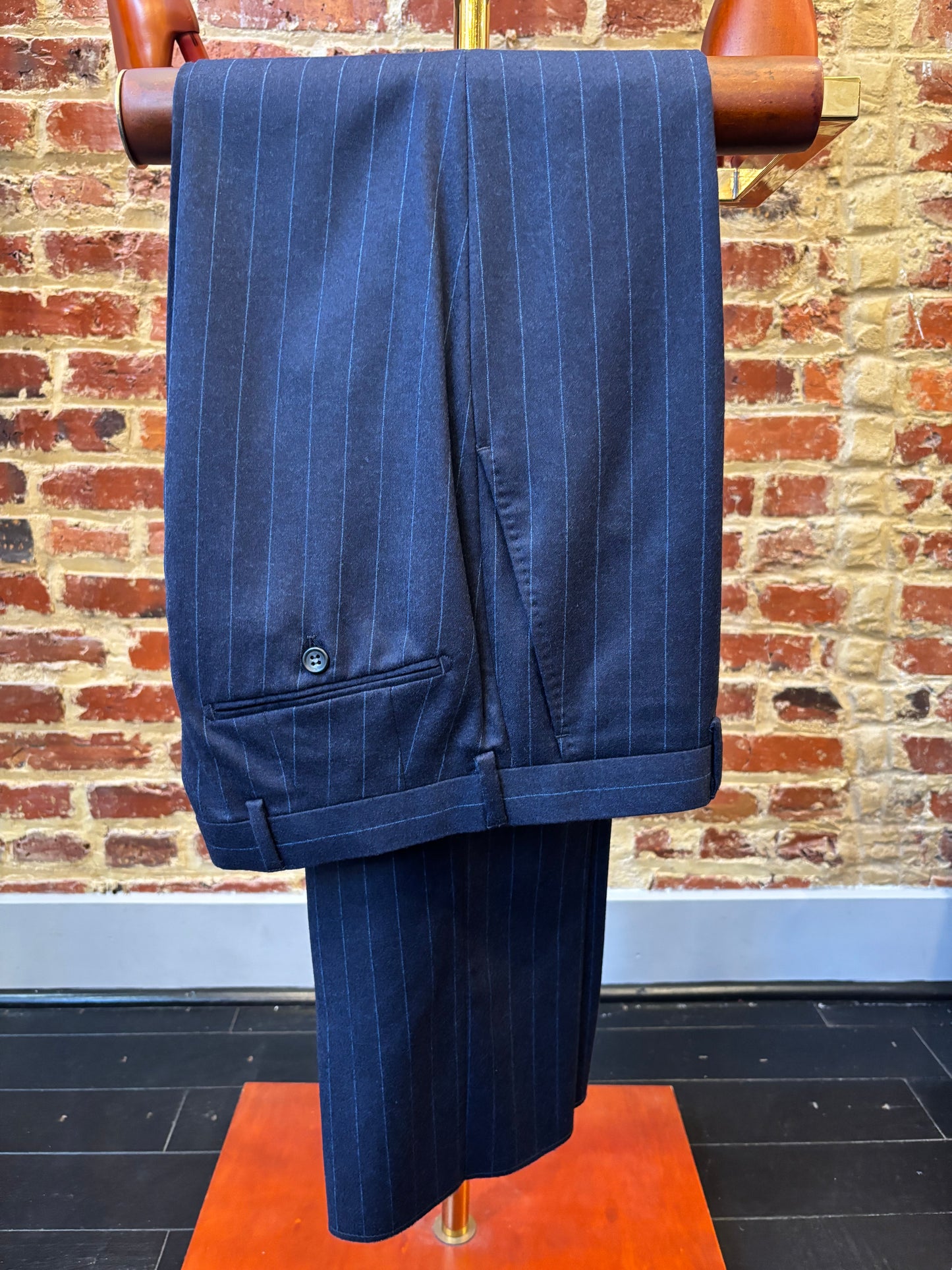 Navy blue suit with light blue stripes