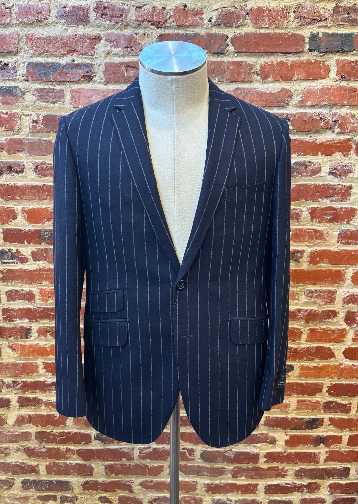 Dark navy blue suit with white stripes